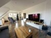 Traumhafte 3-Zimmer-Dachgeschosswohnung mit Balkon - Wohnzimmer