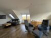 Traumhafte 3-Zimmer-Dachgeschosswohnung mit Balkon - Wohnzimmer